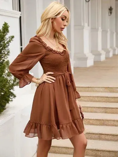 Look Fab in a Tie Front Ruffle Hem Smocked Mini Dress