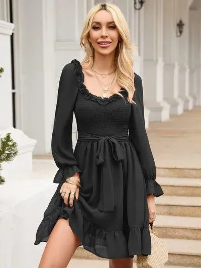 Look Fab in a Tie Front Ruffle Hem Smocked Mini Dress