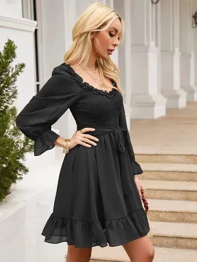 Look Fab in a Tie Front Ruffle Hem Smocked Mini Dress