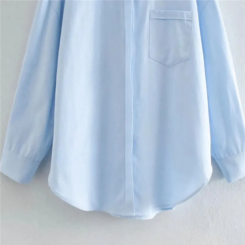 LOOSE ASYMMETRIC BLOUSE