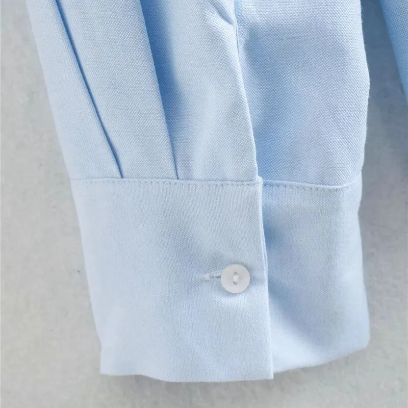 LOOSE ASYMMETRIC BLOUSE