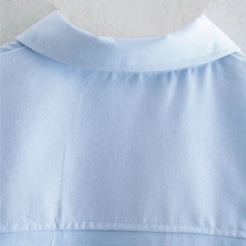 LOOSE ASYMMETRIC BLOUSE